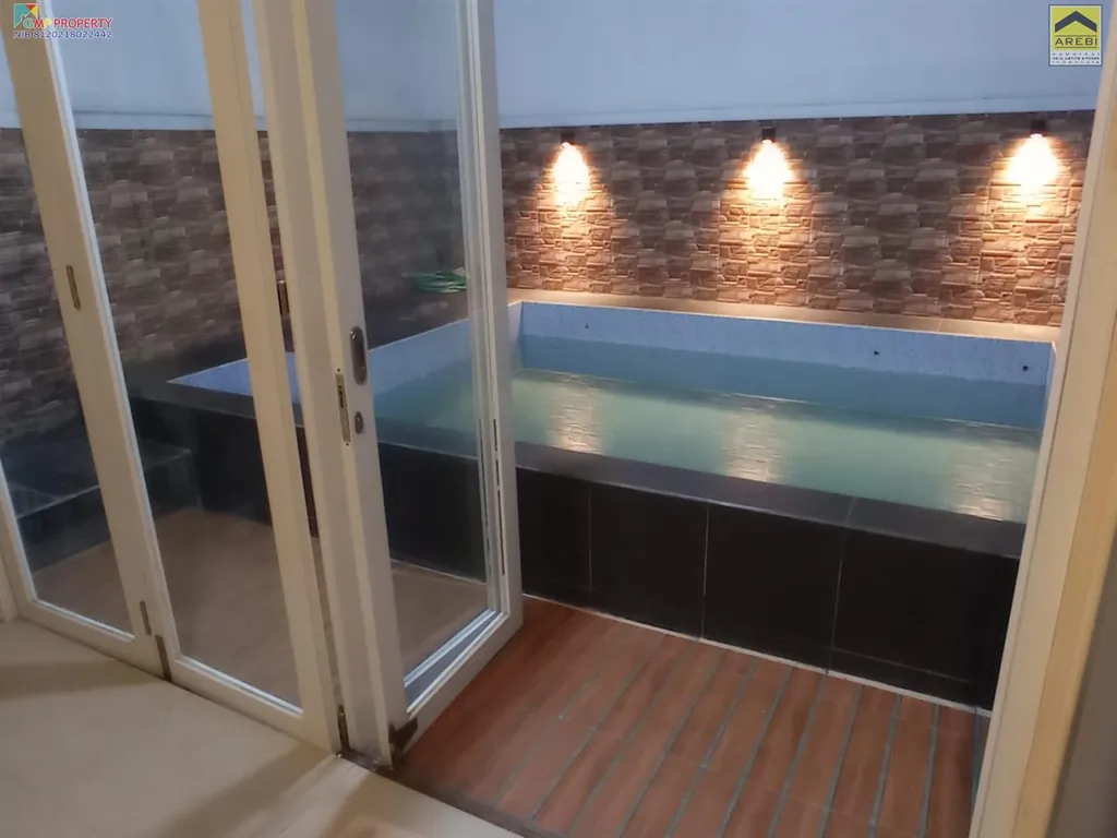 rumah 2 lantai ada kolam renangnya  di Mekar Rahayu nyaman dan strategis.jfif